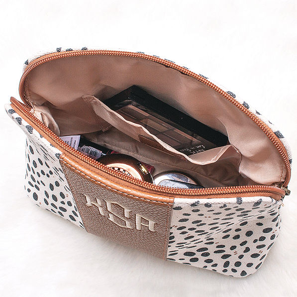 inside zippered cosmetic case with small pocket