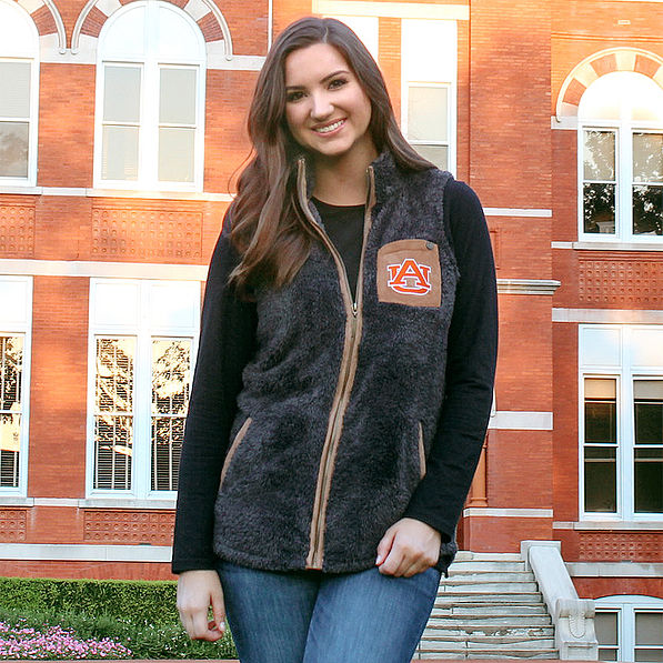 student wearing auburn university sherpa vest on campus
