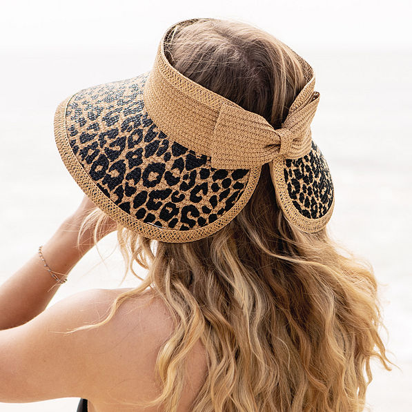back of tan leopard monogrammed packable straw visor