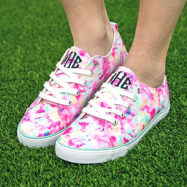 monogrammed tie dye sneakers on grass