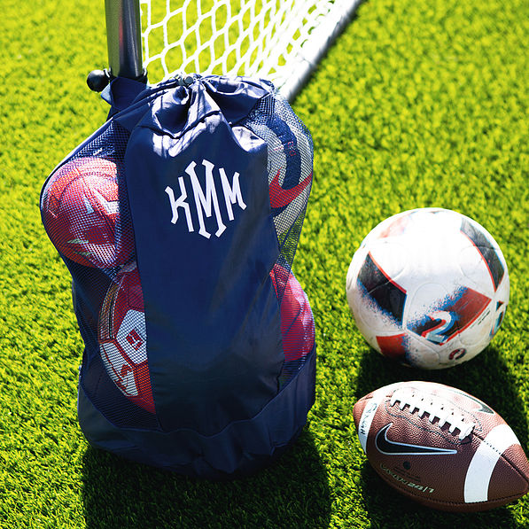 navy backpack bag with sports balls