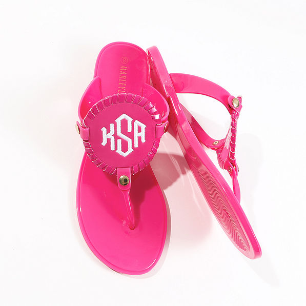 hot pink monogrammed flip flops front and side