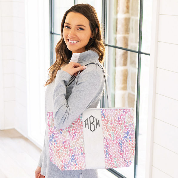 colorful watercolor tote over shoulder