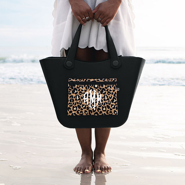 black waterproof tote and white cover up
