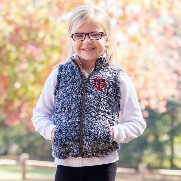 girl wearing charcoal texas A&M sherpa vest