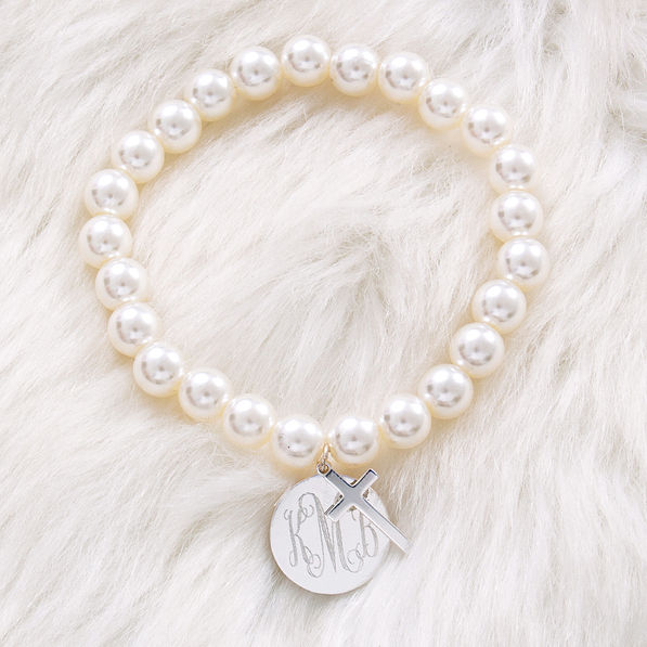 pearl bracelet with monogrammed disc and cross