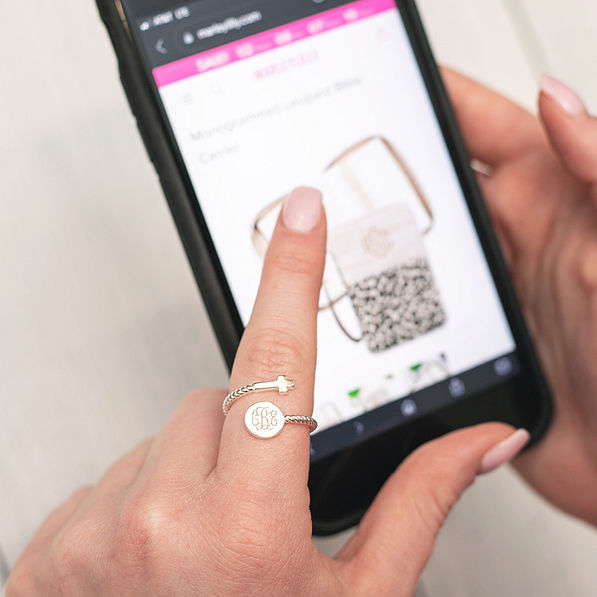 adjustable cross ring on pointer finger