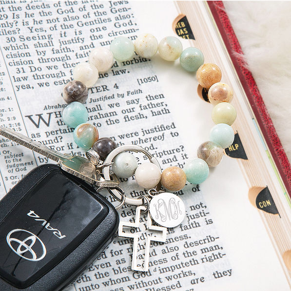 Monogrammed Cross and Bead Keychain on bible
