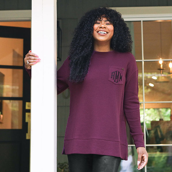 model wearing win waffle sweatshirt