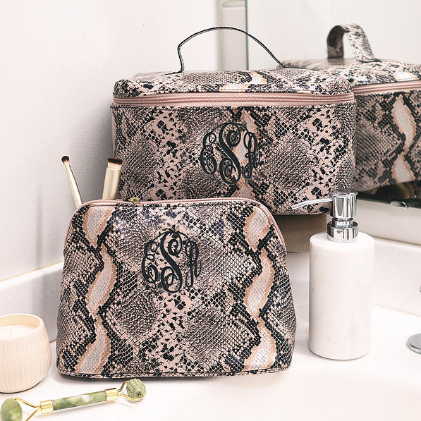 snakeskin cosmetic case and train case