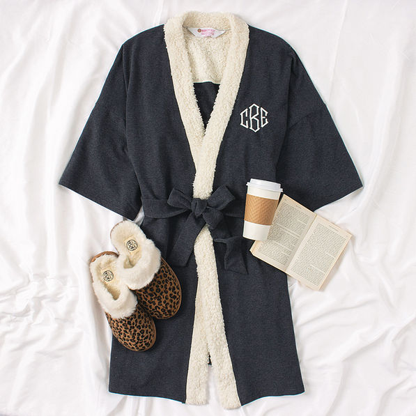 Monogrammed Sherpa Robe with book on bed
