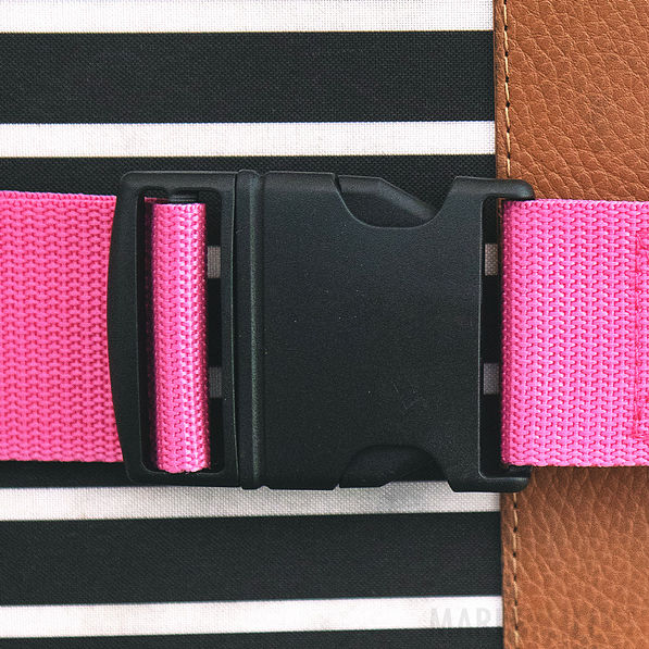 buckle of monogrammed luggage strap