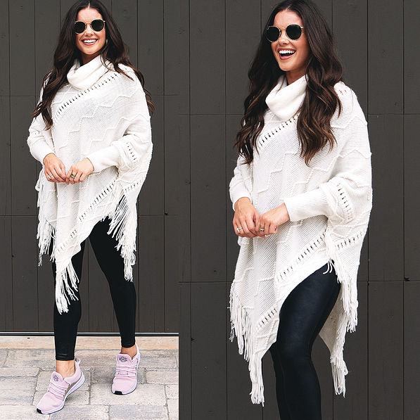 fringe poncho sweater styled for athleisure with sneakers