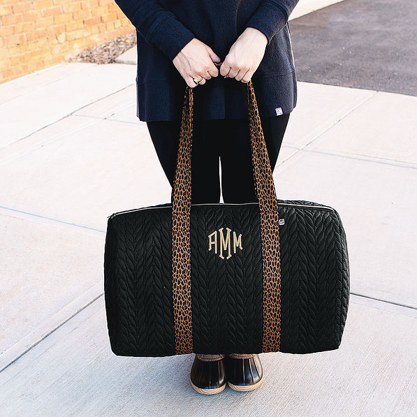 Holding Leopard Duffel Bag