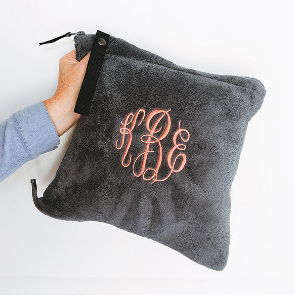 packed monogrammed travel blanket