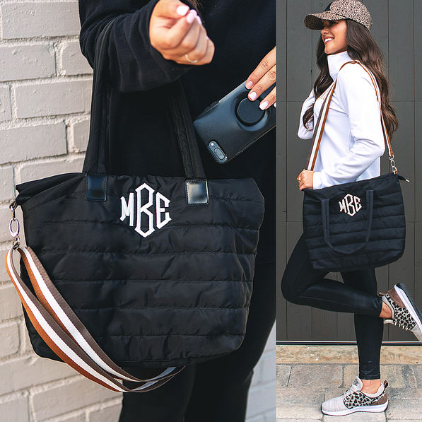 monogrammed quilted crossbody bag on arm and shoulder