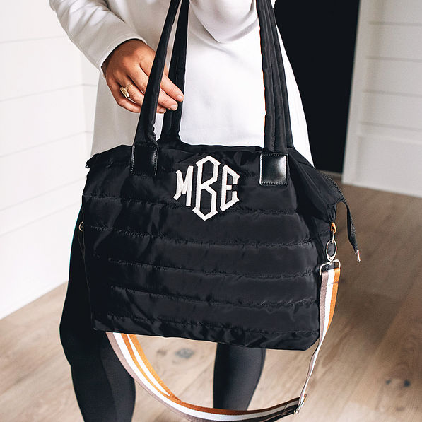 black monogrammed quilted crossbody