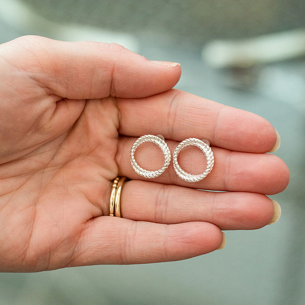 rope circle earrings in hand
