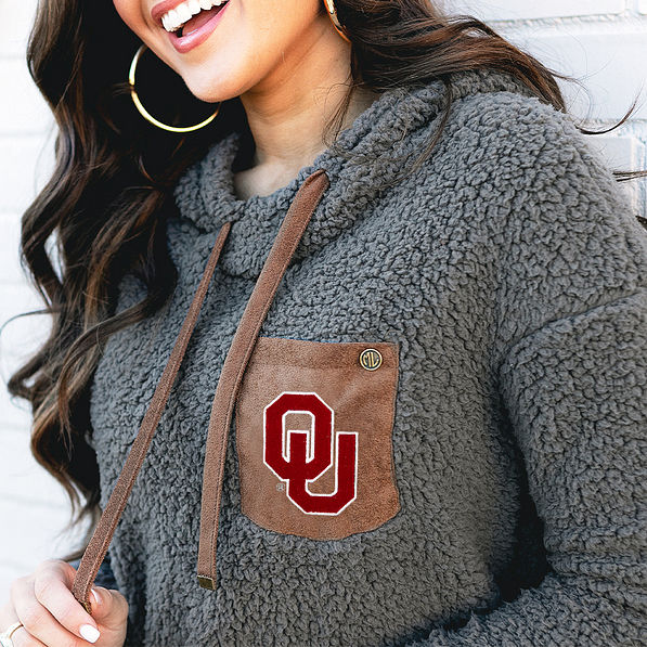 detail of oklahoma logo on sherpa hoodie