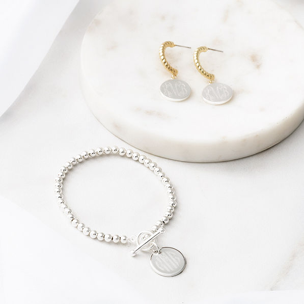 silver dainty bracelet with cable hoop earrings