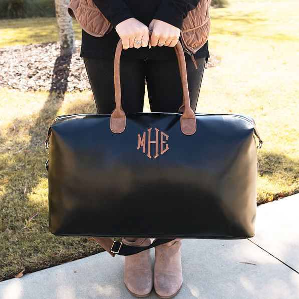 monogrammed overnighter with sturdy drop handles