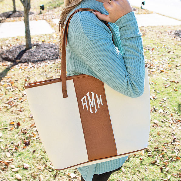 monogrammed canvas stripe tote on shoulder