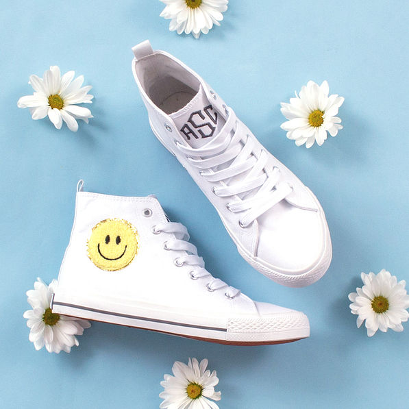 high top canvas sneakers with smiley face patch