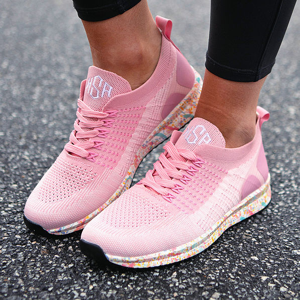 angled shot of monogrammed confetti sneakers