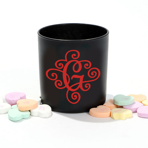 red vinyl sticker on candle with valentines vibes