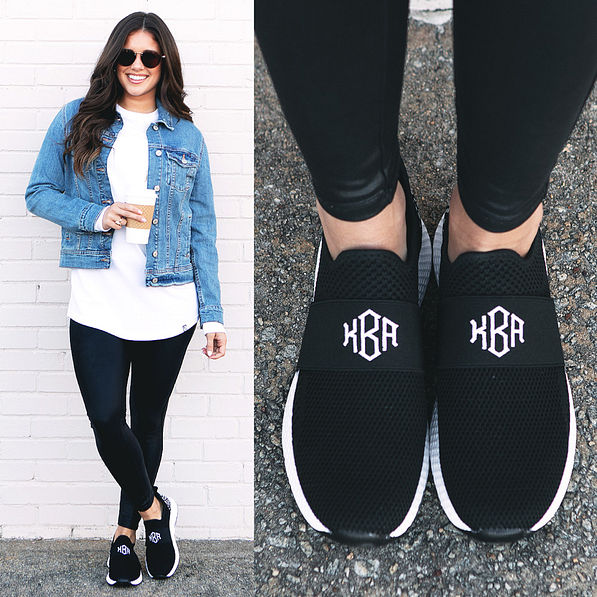 monogrammed slip on sneakers styled with leggings and denim jacket