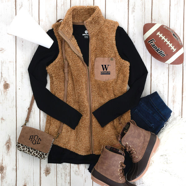 camel wofford sherpa vest with black dropped hem layering tee