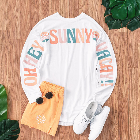 Sunny Vacay Jersey with orange shorts and slide on shoes