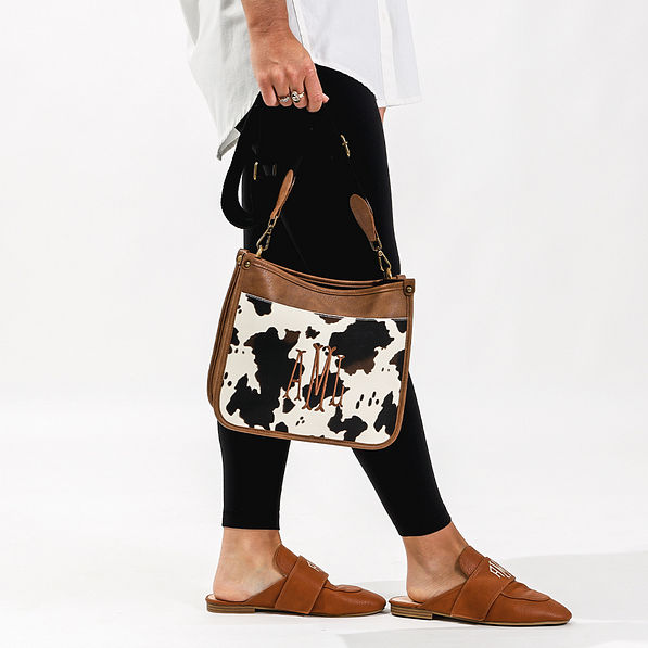 saddlebag in cowhide with loafers