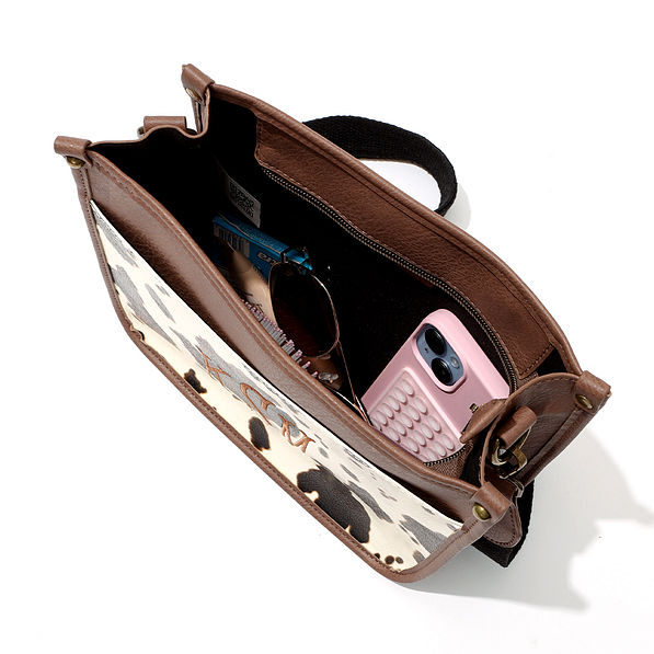 inside shot of cowhide saddlebag WITH ZIPPER CLOSURE