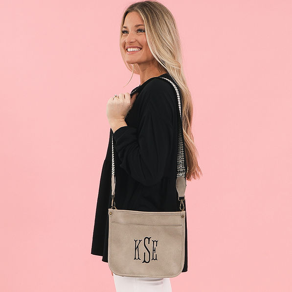 black and white monogrammed saddlebag with wallet