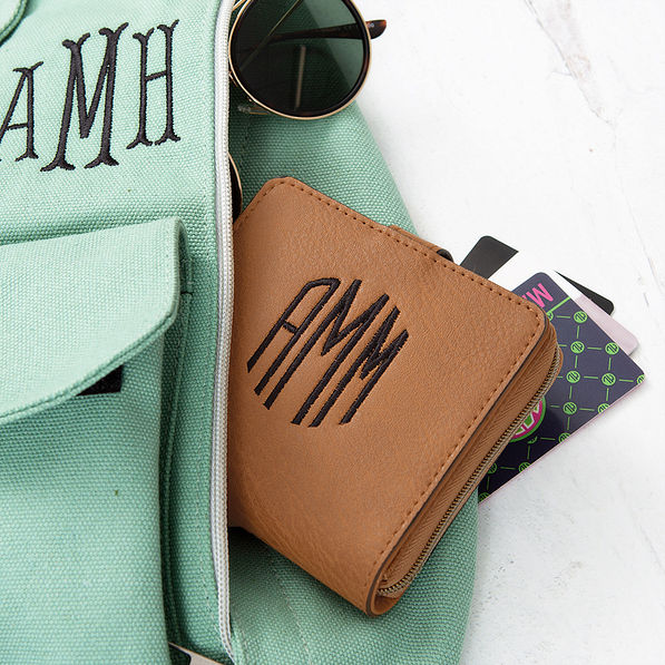 Monogrammed sling pack with square Wallet in Brown