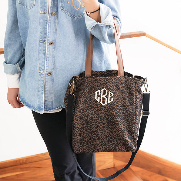 dark leopard canvas bag on arm