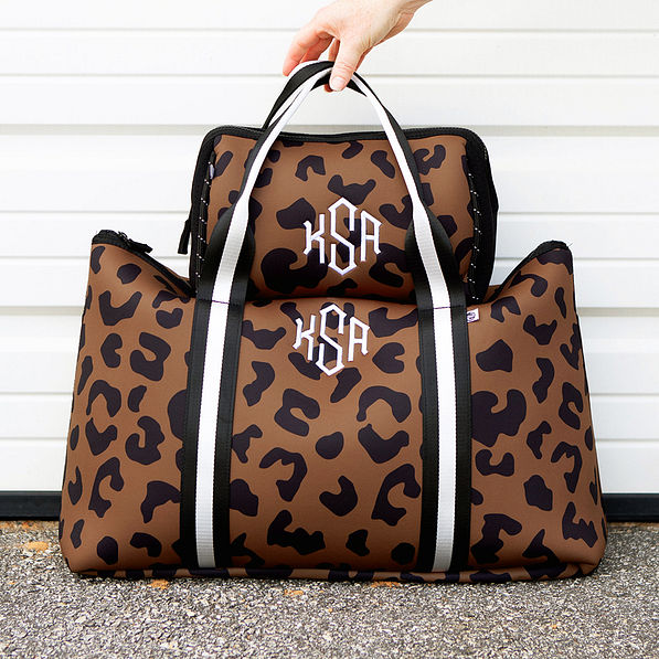 Monogrammed Neoprene Cosmetic Case in Hickory Leopard with matching carry on bag