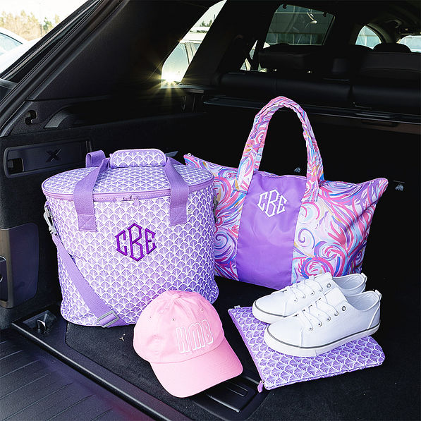 packable duffel bag in purple splish splash with purple shell cooler car trunk shot
