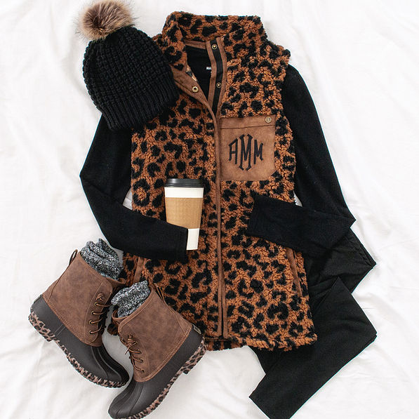 monogrammed leopard sherpa vest with chunky knit beanie and leopard bottom duck boots