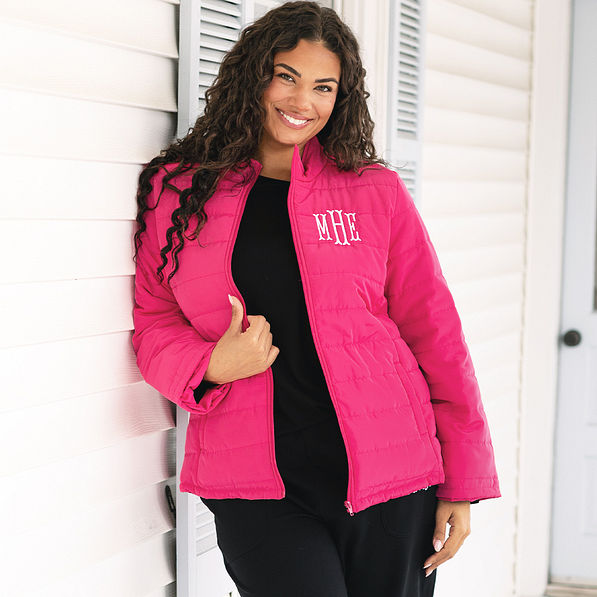 girl wearing personalized hot pink puffer jacket with leggings