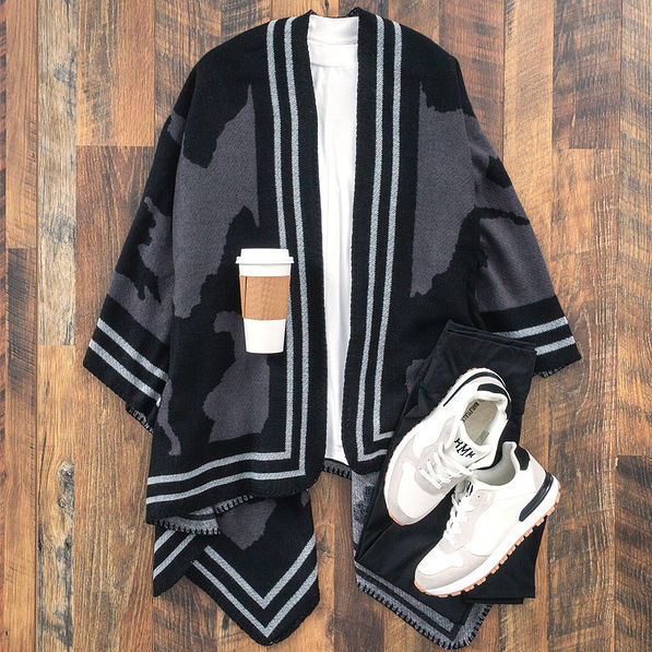 onyx poncho with monogrammed classic sneakers