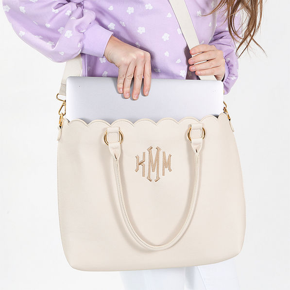 bone laptop tote bag on shoulder