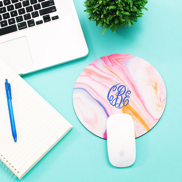 8' mouse pad with laptop on blue paper