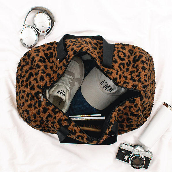 inside of sherpa duffel bag in leopard