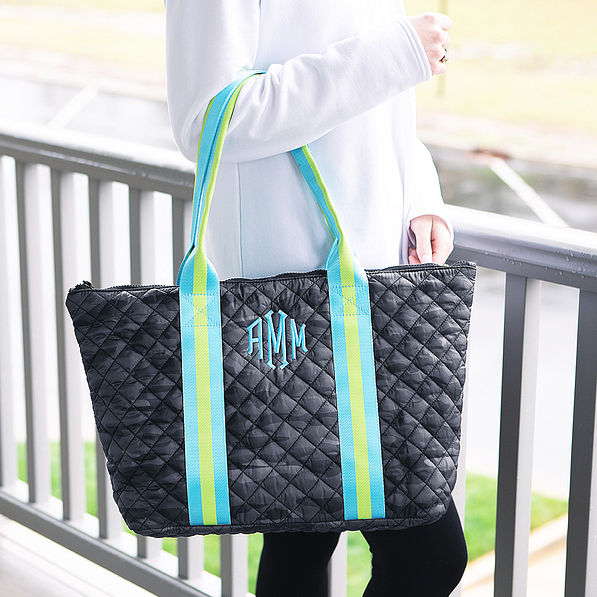 Girl with Black Camo Puffer Tote on arm