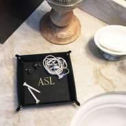 black valet tray in bathroom