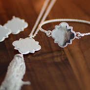 custom silver quatrefoil jewelry collection