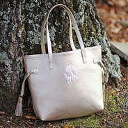 Gold Personalized Purse Against Tree Trunk