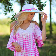 white sun hat with multicolored poms